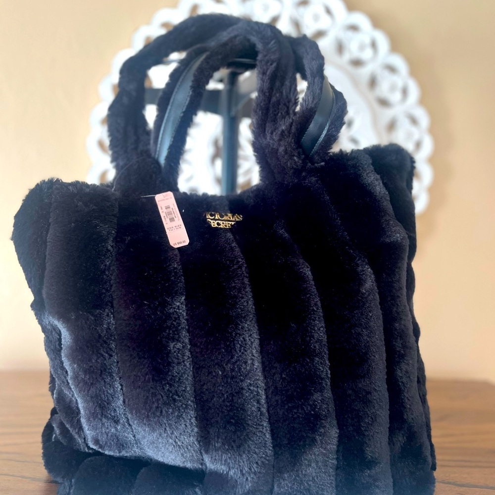 Victoria Secret Faux fur BlackBag with magnetic snap closure. New with tags .